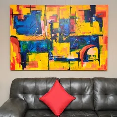 A large, vibrant abstract painting on canvas created for a living room. We work with clients to develop a color palette and style that complements their furniture and decor.