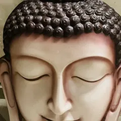 A close-up of one of my custom Buddha statues. I can create these statues in sizes ranging from 15 inches to 5 feet tall and paint them in your favorite colours to match your decor. This one has a serene, classic finish.