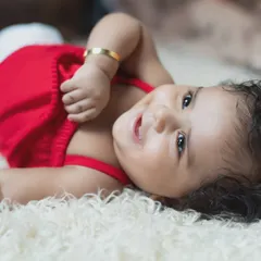 This little one's joyful expression is simply contagious.