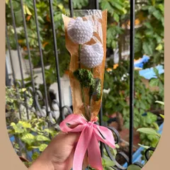 Another look at the "Hugging Tulips" bouquet, a popular choice for a simple, elegant gift. Each tulip is carefully crafted to capture the flower's classic shape, creating a piece of decor that is both minimalist and charming.