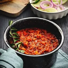 Another look at my popular fire-roasted tomato chutney, a versatile condiment that can be eaten with dosa, idli, rice, or roti.