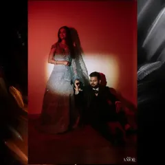 Using bold red lighting to create a passionate and artistic couple portrait. The dramatic shadows and intense color make this a powerful and modern image.