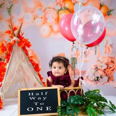 Another shot from the half-birthday session, featuring a cute little chalkboard sign to mark the special occasion.