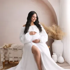 A joyful, candid smile is one of the most beautiful things to capture. This portrait is all about the happy anticipation and the natural glow of the mom-to-be.