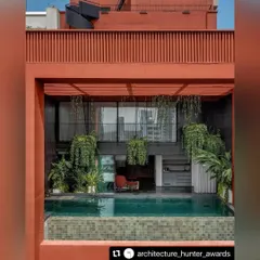 Our designs seamlessly blend recreation with nature. Here, a rooftop pool is framed by hanging and potted plants, creating a tranquil escape where the water reflects the sky and the greenery provides a sense of privacy and serenity.