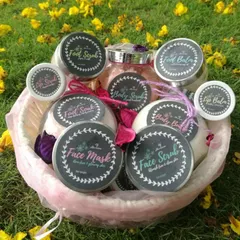 A basket full of my handmade skincare goodies. You can see my lip scrubs, face masks, body scrubs, and foot balms all ready to go. Each product is made with 100% natural ingredients to nourish your skin from the outside in.