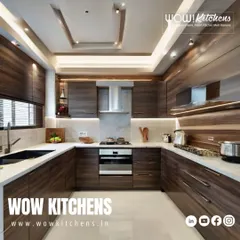 A fully wood-paneled U-shaped kitchen that exudes warmth and sophistication. The consistent wood grain across all cabinets, paired with a white countertop and integrated appliances, creates a seamless and high-end rustic look.