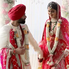 We capture the solemnity and beauty of diverse wedding traditions, like this moment from a Sikh ceremony. Our focus is on the meaningful interactions and rituals that define your union, ensuring every cultural detail is respected and beautifully documented.