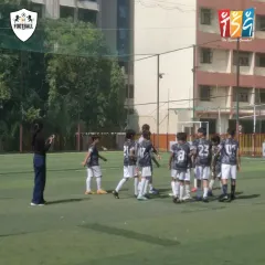 A great start to the campaign for our TSG Football School team. Here, our coach gives a team talk during a 2-1 victory, highlighting our focus on strategy and teamwork from a young age.