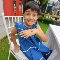 This amazing smile says it all. A simple, sparkly blue glitter tattoo on the hand brought so much happiness, and that’s exactly what I aim to do at every party I attend.