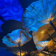 The 'Submerge' lighting installation by Oorjaa Design, seen at India Design ID. We were drawn to the organic, mushroom-like forms and the ethereal glow created by the use of handmade paper.