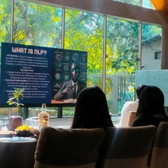 The presentation screen during the AI workshop, showing the high-tech capabilities of our event space.