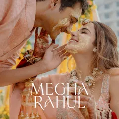 An intimate Haldi moment. I focus on the connection between the couple, even amidst the fun and games, capturing the love and laughter.