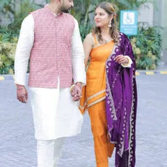 A beautiful portrait of the couple, Dr. Tathagat & Dr. Samridhi, looking elegant in their coordinated outfits for their pre-wedding ceremony.