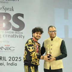Here is one of my talented artists accepting a well-deserved award on the HBS stage. I believe in celebrating every victory, as it reflects the hard work and skill we cultivate at the academy.