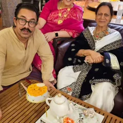 A heartwarming moment as Aamir Khan sits with his mother and her custom-designed birthday cake. We incorporated her love for tea and the intricate pattern of her saree into this edible art piece.