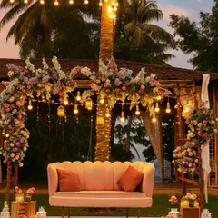 We love crafting those perfect golden hour moments. This romantic and rustic seating for an anniversary celebration combines soft florals, warm bulb lighting, and a cozy setup, making it the perfect spot for dreamy photographs.