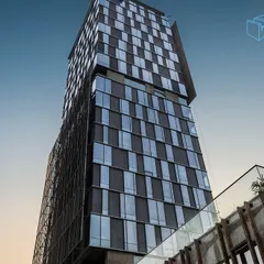 The Sleepwell corporate office, a G+19 beacon tower on the Greater Noida Expressway. Completed in 2018, this LEED Platinum rated building showcases our expertise in creating large-scale, sustainable commercial architecture.