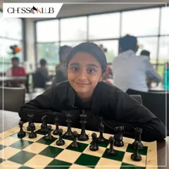 A young player ready for her first game at the new JP Nagar center. We aim to create a welcoming and inspiring space for the next generation of chess lovers.