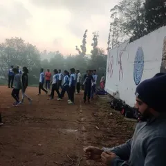 A candid shot from an early morning training session at the Ooty kickboxing camp. These rigorous sessions build the endurance and mental fortitude necessary for competitive fighting.