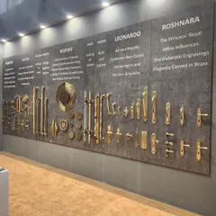 This display wall at IndiaWood Bangalore 2024 showcases several of my collections, from the regal Roshanara to the modern Leonardo. Each collection is presented with a brief description of its design inspiration, telling the story behind the brass.