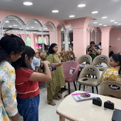 Students getting hands-on experience with DSLR cameras during our Canon-certified photography workshop.