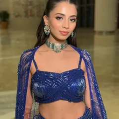The sister of the bride deserves to shine too. Here, I paired a sharp, clean makeup look with a bold blue lehenga, focusing on a flawless base and soft smokey eyes to create a sophisticated and modern sangeet look.