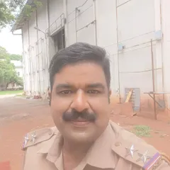 On location at Kanteerava Studio for a film shoot, dressed as a police officer. The studio environment is where the magic of cinema happens.