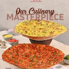 This is my culinary masterpiece, the Kadak Roomali. A giant, paper-thin bread roasted until crisp and topped with a mix of spices and fresh ingredients. It's a showstopper at any event and a dish your guests will talk about long after the party.
