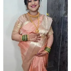 Shweta looking absolutely radiant for her baby shower. This full-length photo captures her happy glow, her beautiful peach saree, and the traditional green bangles.