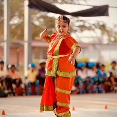 A close-up of the dancer's expressive pose on skates. We encourage all forms of art and movement, and this performance was an inspiration to all our students and parents.