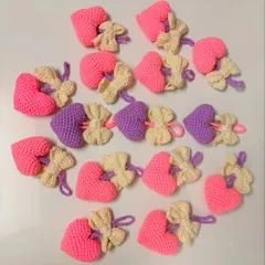 These heart and bow bag hangings are perfect as party favors or small gifts. I can create them in various colors for bulk orders.
