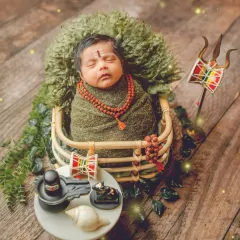 For families wanting to celebrate their heritage, I offer creative cultural themes like this 'Little Mahadev' setup. We can design a unique, meaningful portrait for your baby.