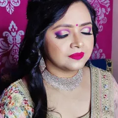 Another angle of this beautiful makeup, showing how the colors are blended seamlessly for a professional, high-fashion look.