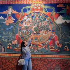 Standing before this incredible "Wheel of Life" mural in Bhutan was a deeply moving experience. The intricate hand paintings and deep-rooted faith you find everywhere make this land magical.