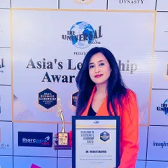 Posing with my award for Excellence in Healthcare & Leadership. This is a proud moment that I share with my dedicated team and my wonderful patients who place their trust in me.