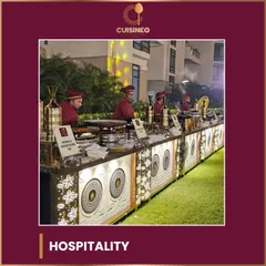 Our professional chefs and servers are the heart of our hospitality. We set up elegant and efficient live counters, like this one for Burrah and Chicken Tikka, ensuring food is served hot, fresh, and with a smile.