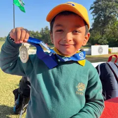 A close up of Samar with his first gold medal. He started learning just four months ago, and his rapid progress is a testament to his dedication and our focused training program.