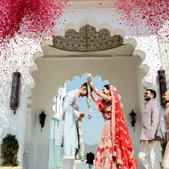 The jaimala ceremony is a highlight of any wedding. I designed this groom's powder blue sherwani to be light and comfortable, yet impeccably detailed for this picture-perfect moment.