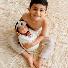 There is nothing more special than the bond between siblings. Capturing the pride and gentle love of a big brother meeting his newborn sister for the first time is one of the most heartwarming parts of my job.