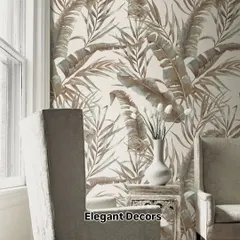 This tropical leaf pattern wallpaper adds a touch of nature and sophistication to this living space. It's a premium wallpaper that creates a serene and elegant backdrop.