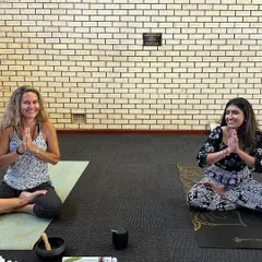 A moment of shared peace during a meditation class in Geraldton, Australia. Group settings like this amplify the positive energy, making the practice even more powerful.