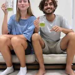That post-float feeling. This couple is seen relaxing with a refreshing drink after their shared experience in our sensory deprivation tank, a session designed to reduce stress and deepen connection.