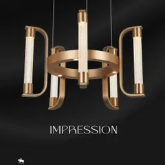 The 'Impression' chandelier is a modern classic, combining a brushed gold frame with textured crystal cylinders. I recommend this fixture for dining rooms or boardrooms where you want to make a statement of confident luxury.