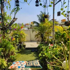 A garden is a space to be lived in. I design cozy seating nooks like this one, perfect for your morning tea or simply sitting quietly among the plants on a sunny Bangalore afternoon.