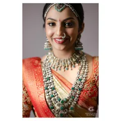 A detailed shot of the exquisite jewelry and makeup. I teach my students how to apply makeup that complements, rather than competes with, heavy traditional jewelry.