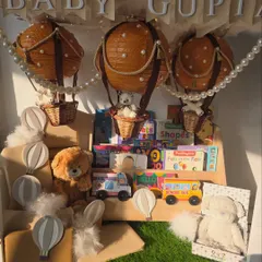 A well-lit shot of the 'Baby Gupta' hot air balloon setup, capturing the magical and whimsical feel of the gift.