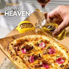 A "Slice of Heaven." Our wood-fired pizza drizzled with infused olive oil, topped with pickled onions and chicken. A gourmet pizza experience for your guests.