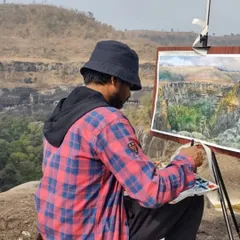 Here I am working on a watercolor painting, capturing the landscape from the Ajanta Caves viewpoint in Maharashtra. My studio is wherever I find inspiration, from bustling city streets to serene historical sites.
