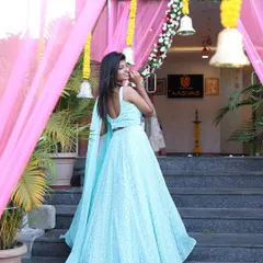 This is a duplicate of the previous shot, capturing the model in a light blue lehenga. The image is perfect for showcasing designer ethnic wear for events and celebrations.